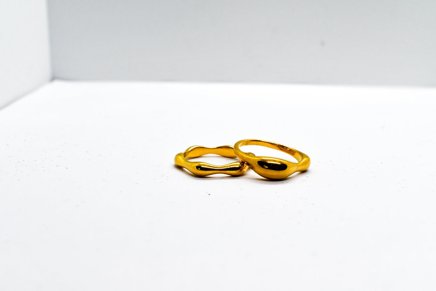 2 STACKABLE GOLD RINGS