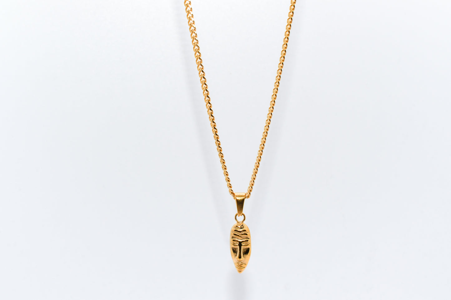 GOLD MASQUERADE PENDANT WITH CUBAN CHAIN